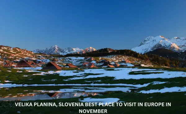 Velika Planina, Slovenia in November – A snowy landscape of Velika Planina’s alpine huts under a crisp winter sky