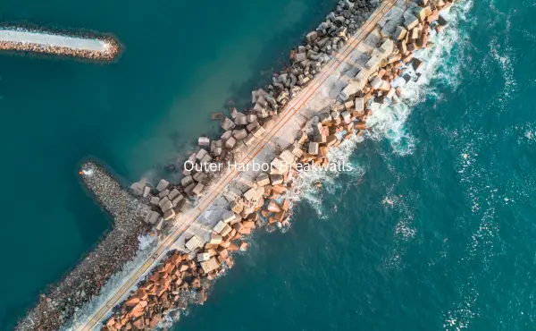 The image captures the serene Outer Harbor Breakwalls